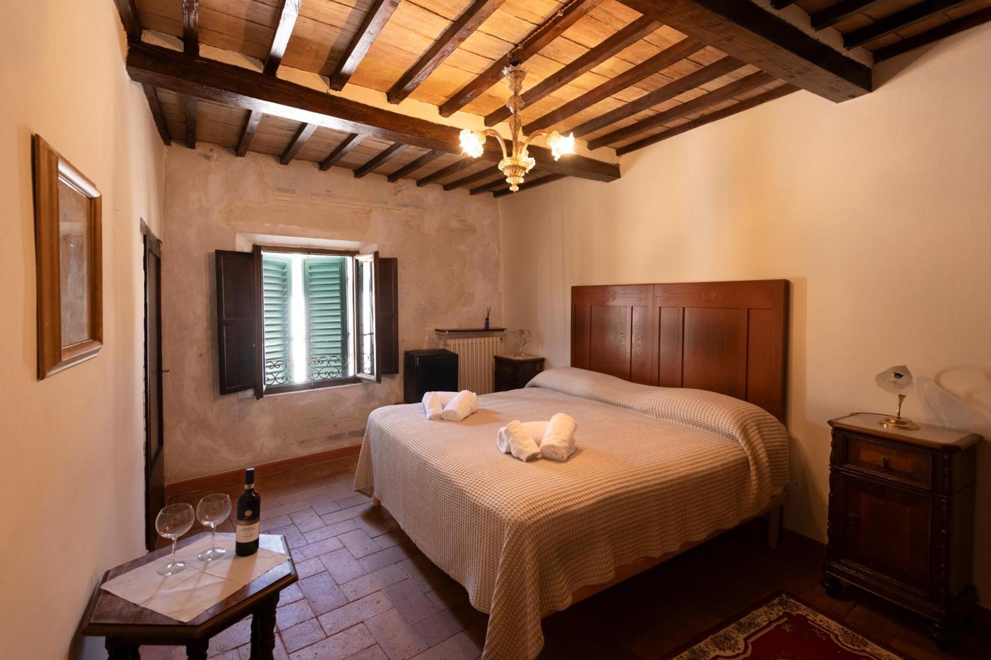 Bed and Breakfast Il Palazzo Del Cardinale Монтальчино Экстерьер фото